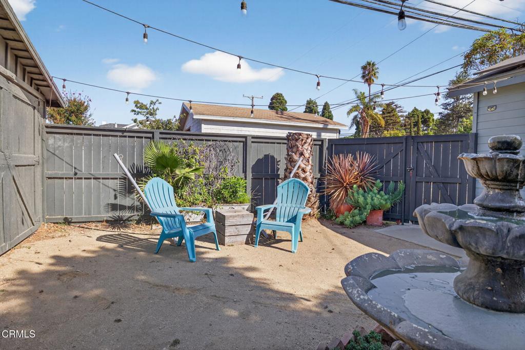 407 Magnolia Avenue Oxnard, CA 93030 - Photo 65 of 76 a view of a chairs and table in the patio