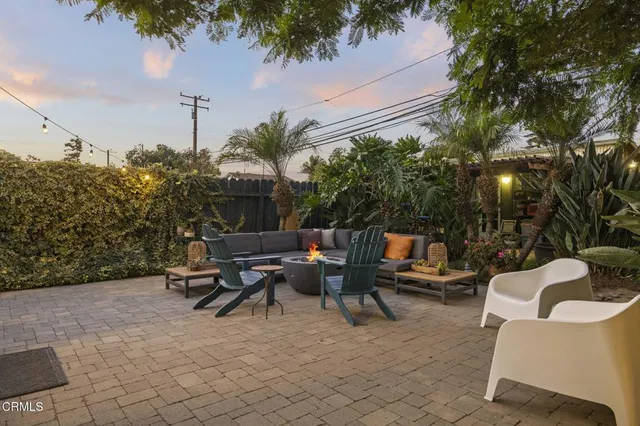 a view of a building with sitting area