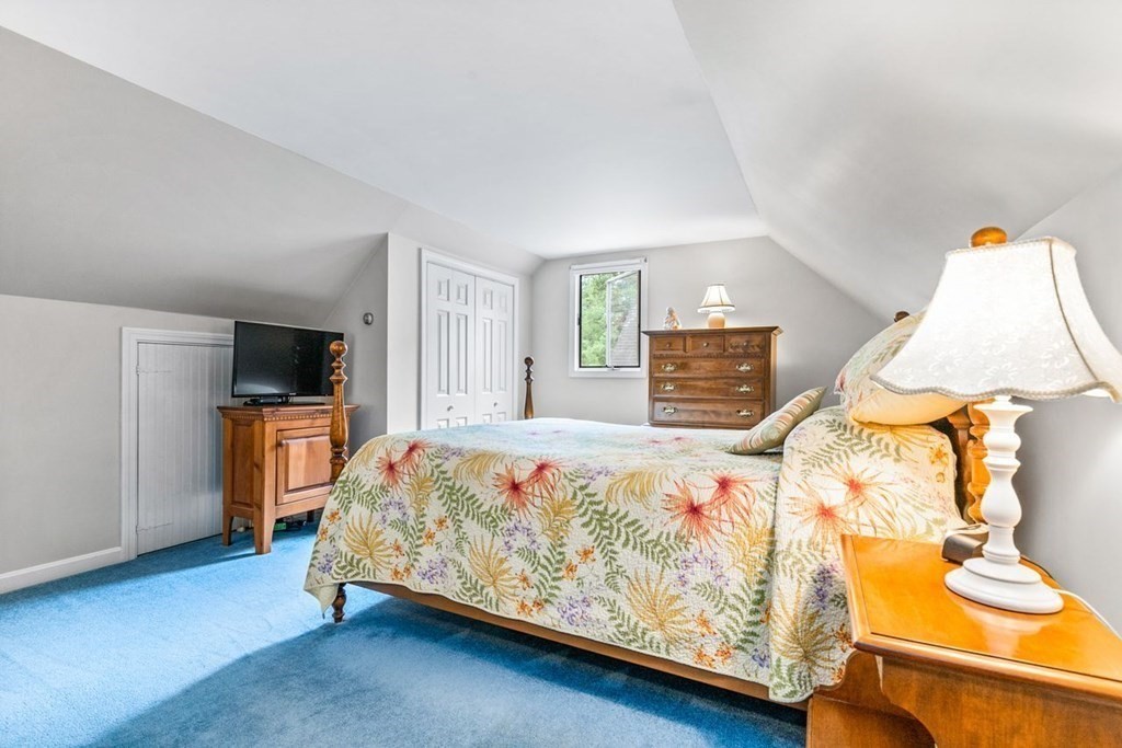 512 County Road Marion, MA 02738 - Photo 13 of 34 a bedroom with a bed and flat screen tv