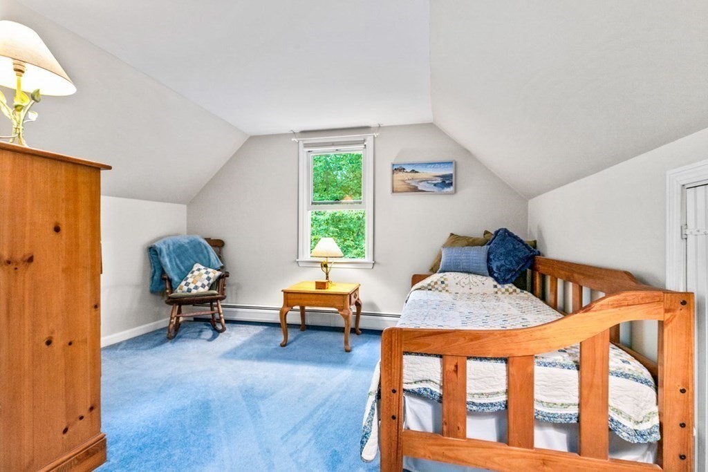 512 County Road Marion, MA 02738 - Photo 17 of 34 a bedroom with furniture and a window
