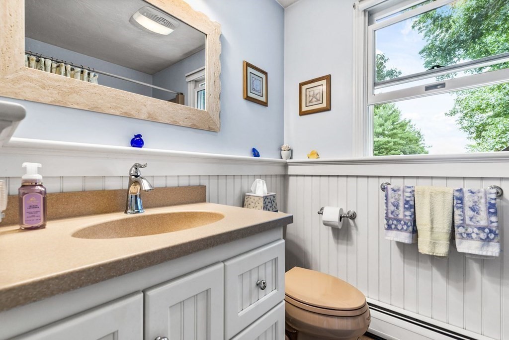 512 County Road Marion, MA 02738 - Photo 20 of 34 a bathroom with a sink a toilet and a window