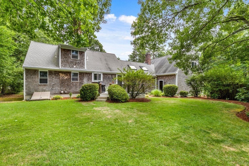 512 County Road Marion, MA 02738 - Photo 29 of 34 a front view of a house with a garden