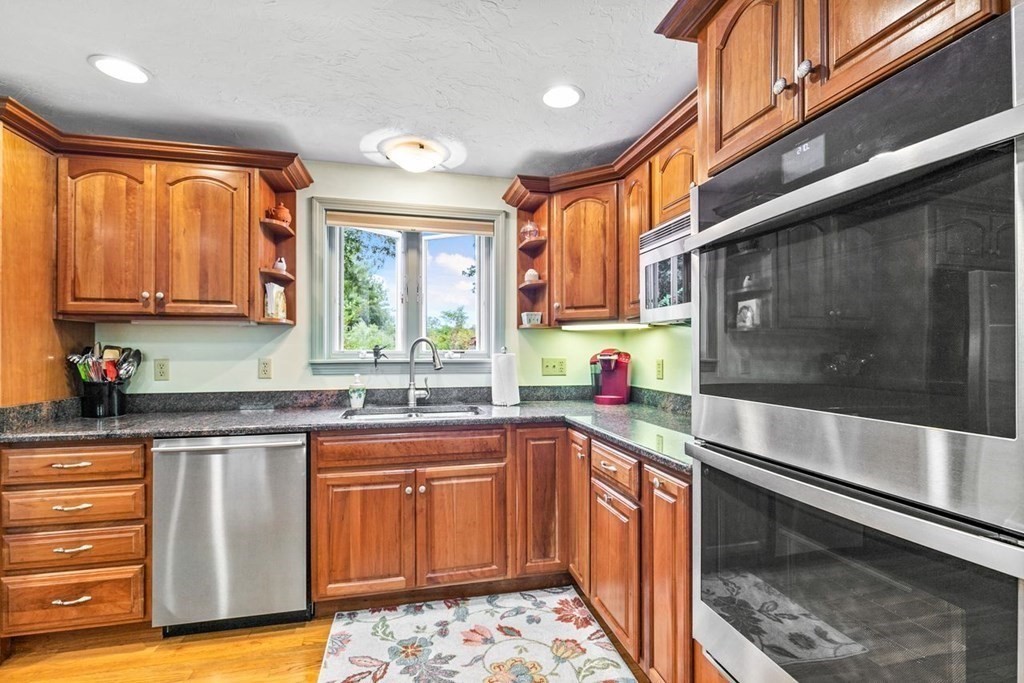 512 County Road Marion, MA 02738 - Photo 7 of 34 a kitchen with a sink stove and cabinets