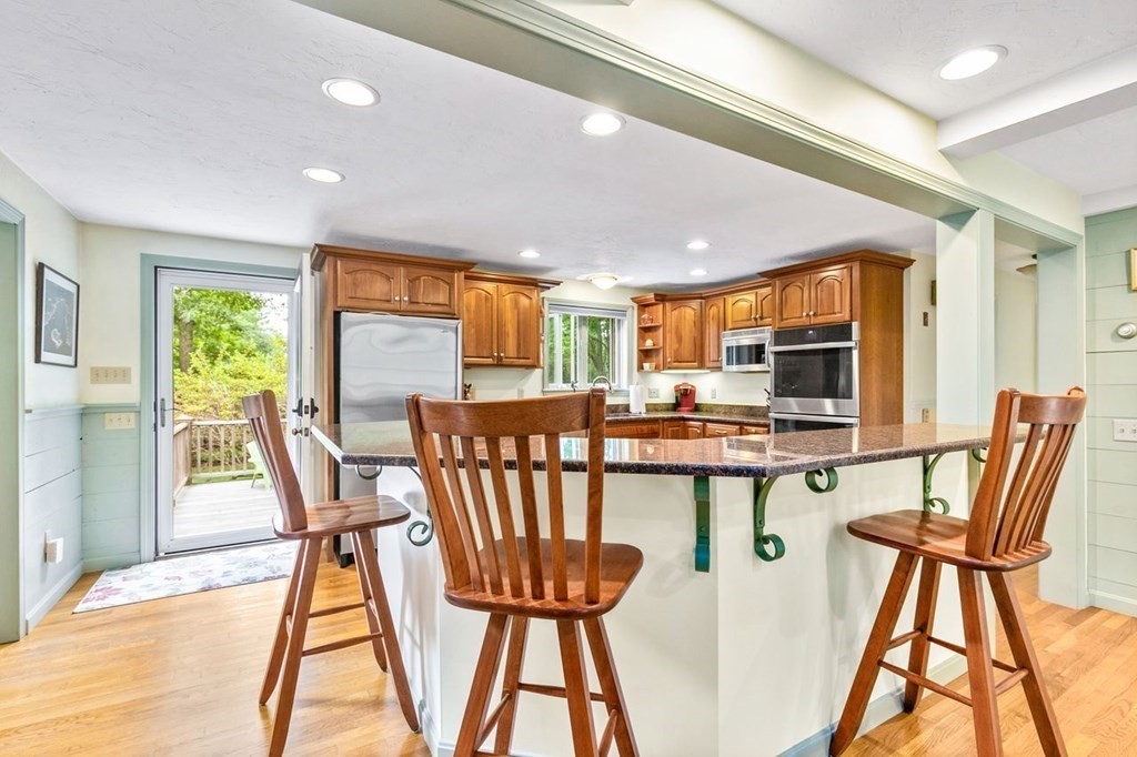 512 County Road Marion, MA 02738 - Photo 10 of 34 a dining room with furniture and a floor to ceiling window
