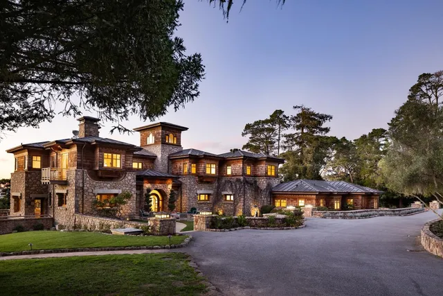 a front view of a building with garden