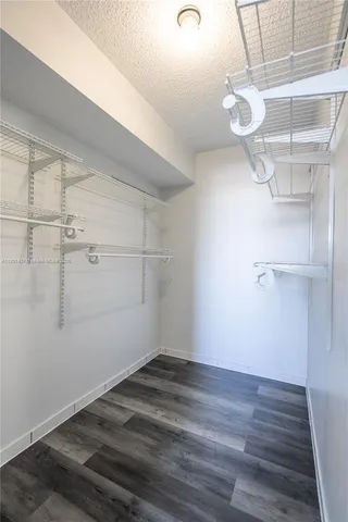 a view of a room with racks on the wall