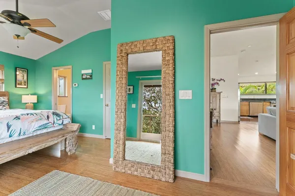 a bed room with a bed and a window