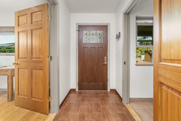 wooden floor and windows in a room