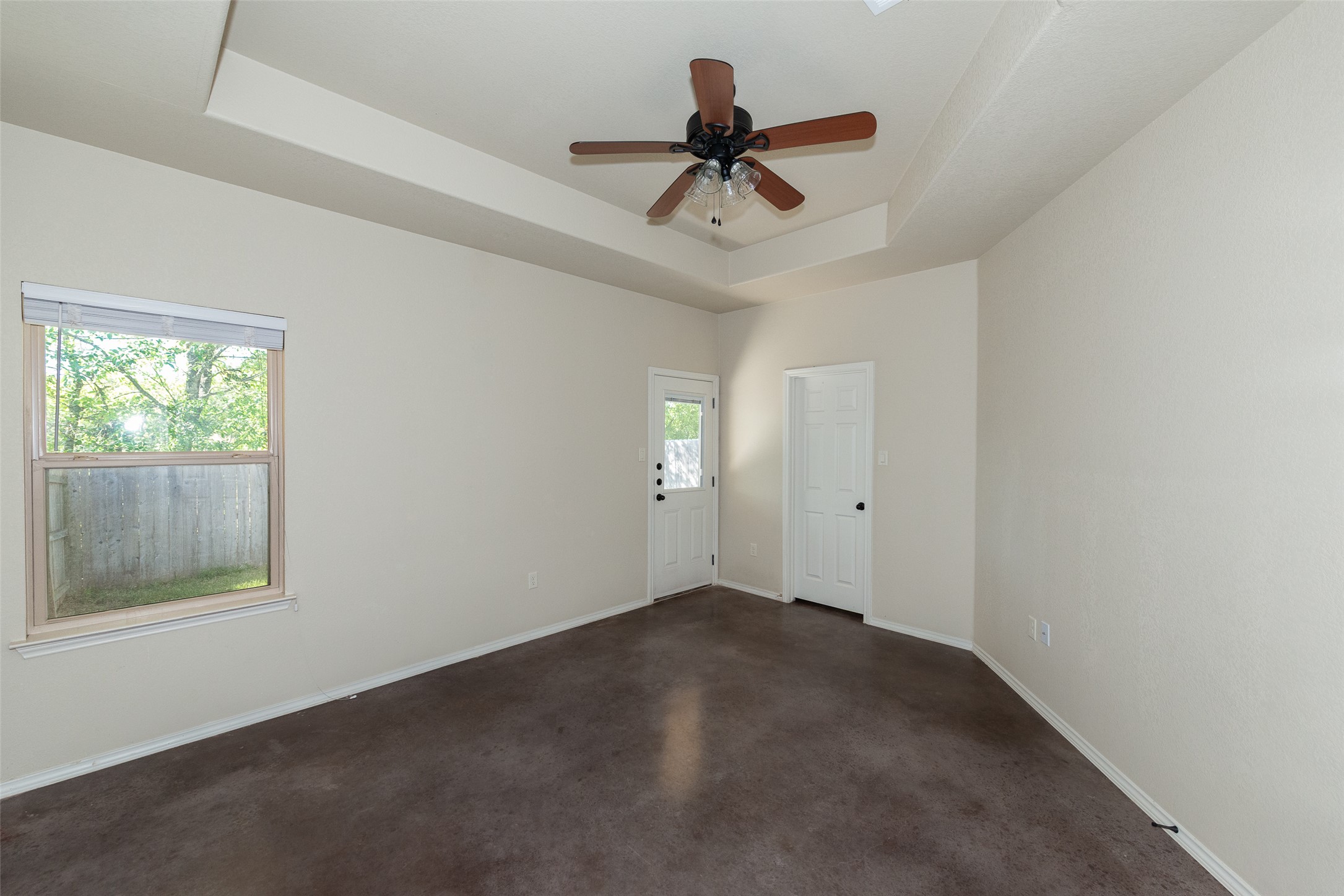 245 Joanne Loop, Unit B Buda, TX 78610 - Photo 21 of 33 Primary bedroom with ensuite full bathroom and walk in closet