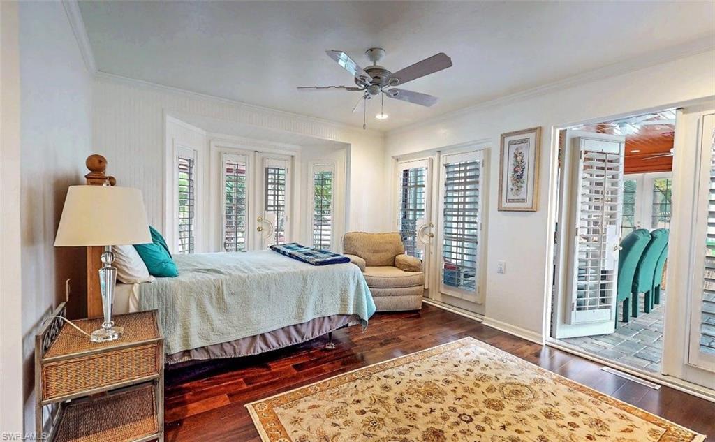 14524 Riverside Drive Fort Myers, FL 33905 - Photo 14 of 23 a bed room with a bed and a window