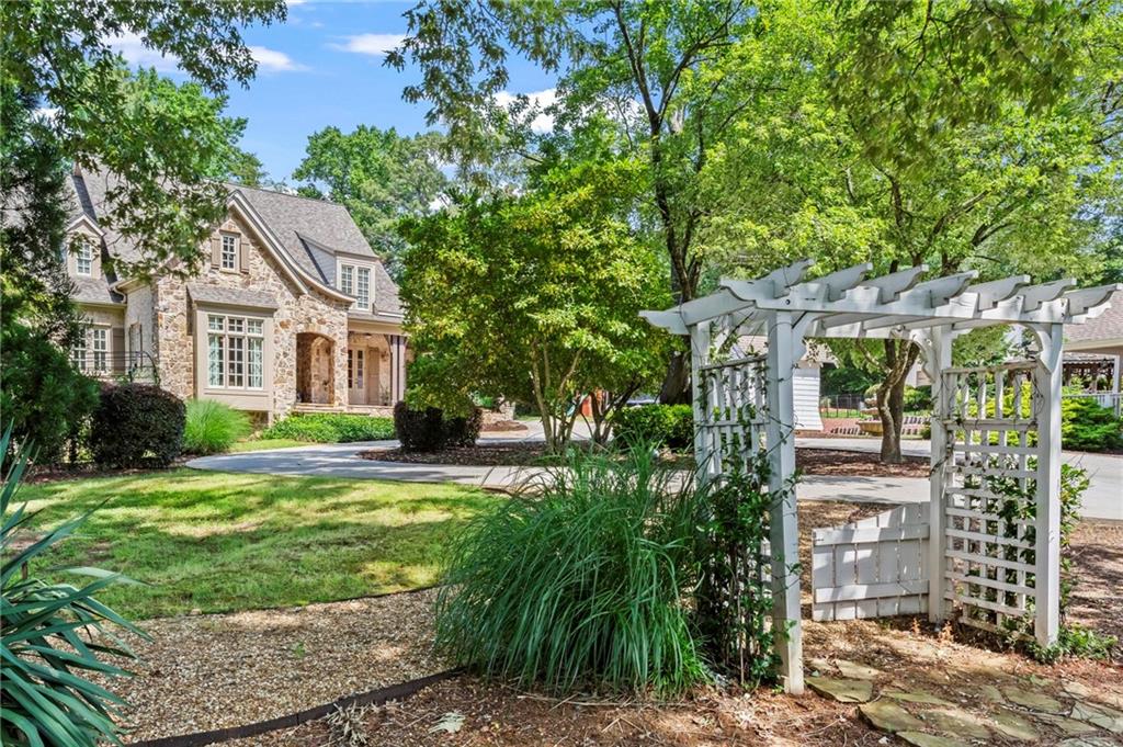 2630 Old Atlanta Road Cumming, GA 30041 - Photo 75 of 87 a front view of a house with garden
