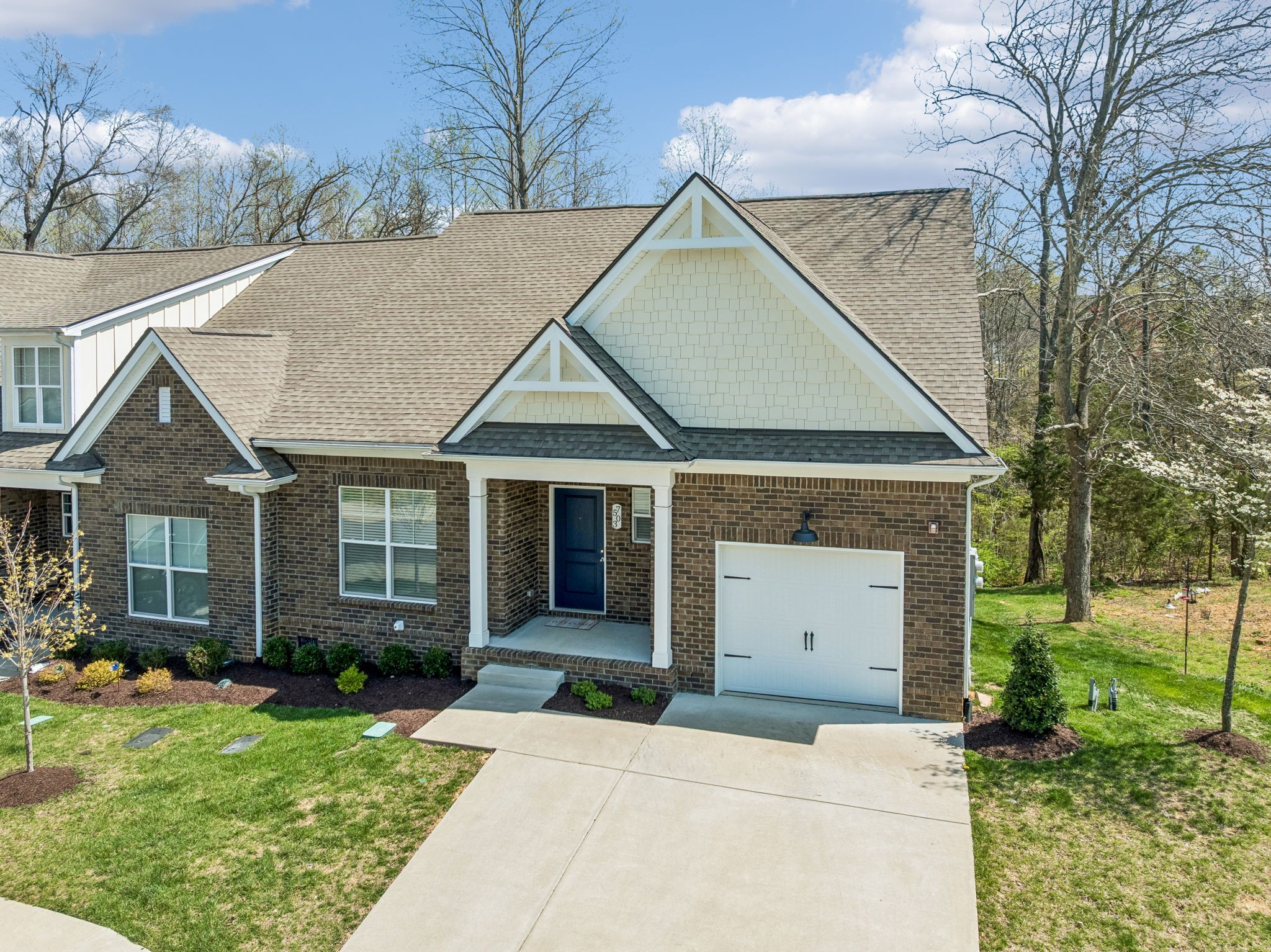 7503 Fernvale Springs Way Fairview, TN 37062 - Photo 2 of 60 a front view of a house with a yard and garage