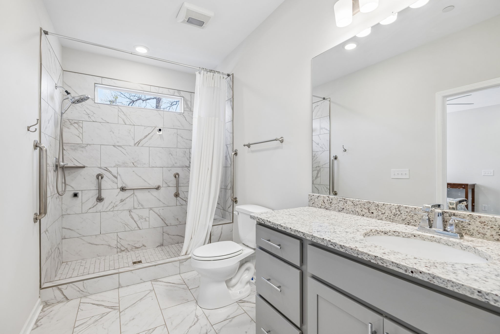 7503 Fernvale Springs Way Fairview, TN 37062 - Photo 34 of 60 a bathroom with a granite countertop sink toilet and shower