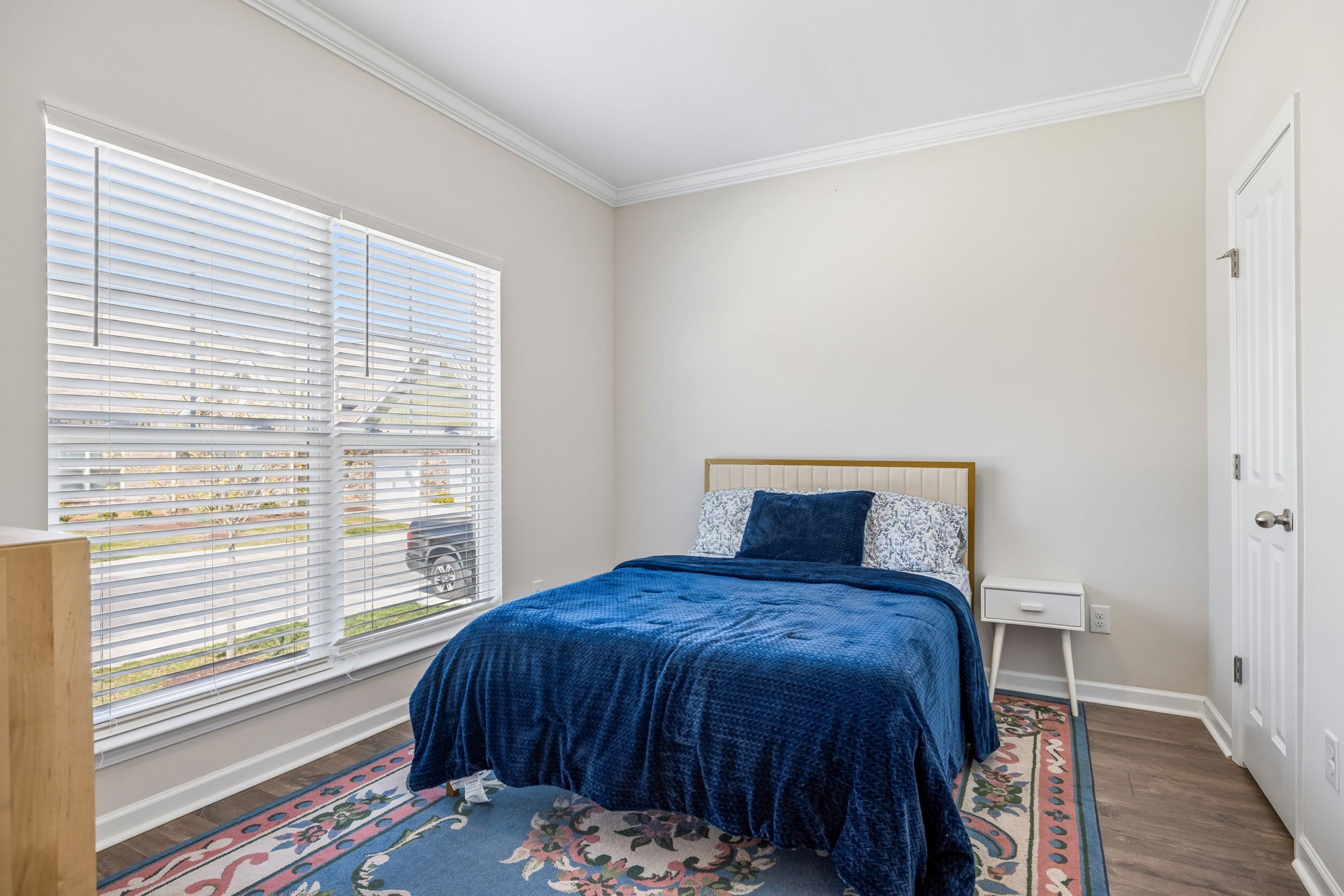 7503 Fernvale Springs Way Fairview, TN 37062 - Photo 38 of 60 a bed sitting in a bedroom next to a window