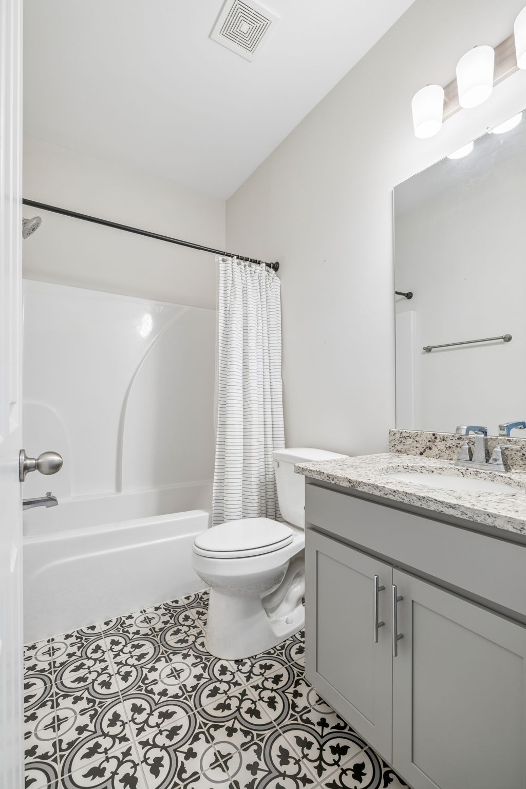 7503 Fernvale Springs Way Fairview, TN 37062 - Photo 39 of 60 a bathroom with a granite countertop sink toilet and shower
