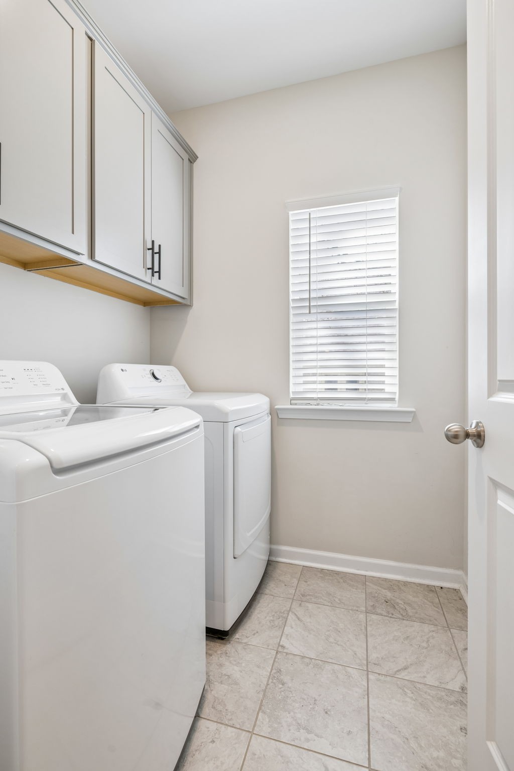 7503 Fernvale Springs Way Fairview, TN 37062 - Photo 40 of 60 a utility room with dryer and washer