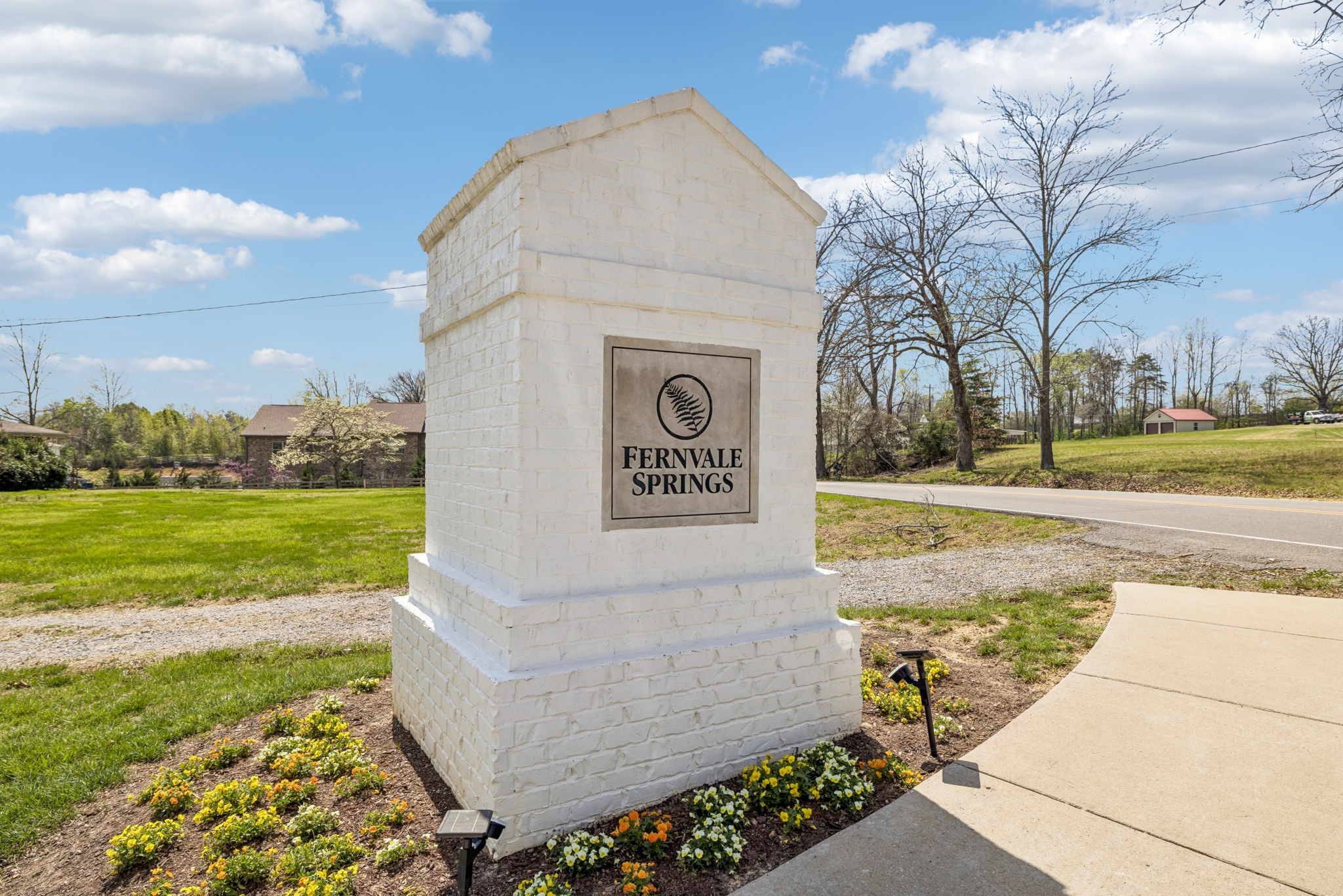 7503 Fernvale Springs Way Fairview, TN 37062 - Photo 4 of 60 a view of a street with a building in the background