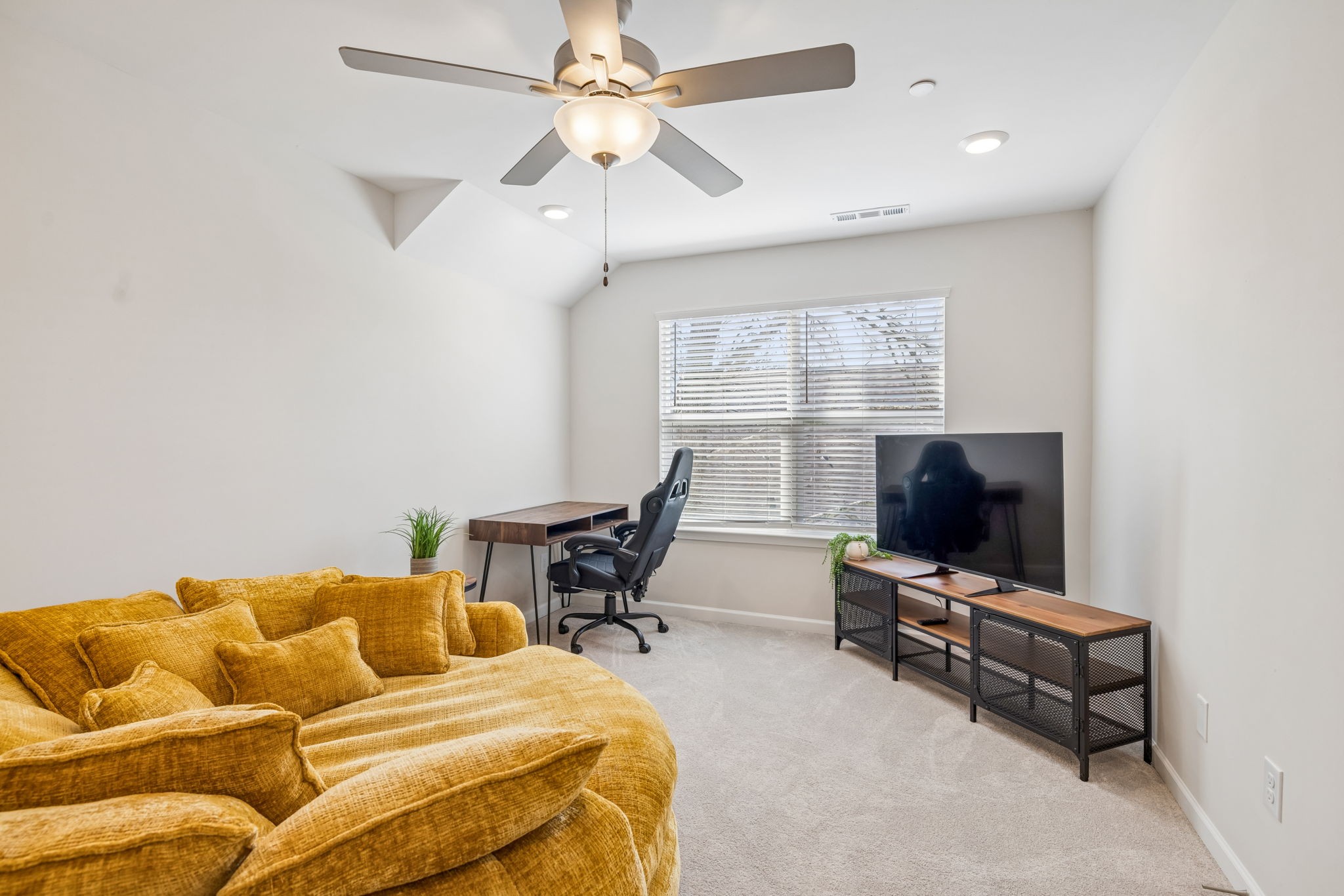 7503 Fernvale Springs Way Fairview, TN 37062 - Photo 43 of 60 a living room with furniture and a flat screen tv