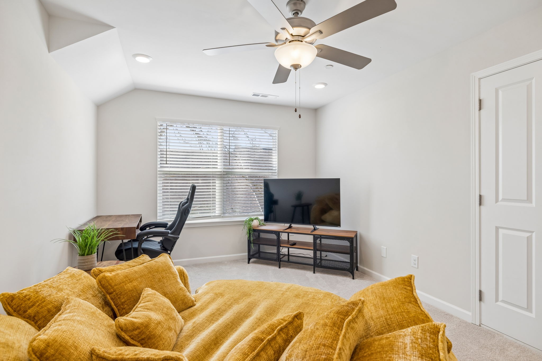 7503 Fernvale Springs Way Fairview, TN 37062 - Photo 44 of 60 a bedroom with furniture and a flat screen tv