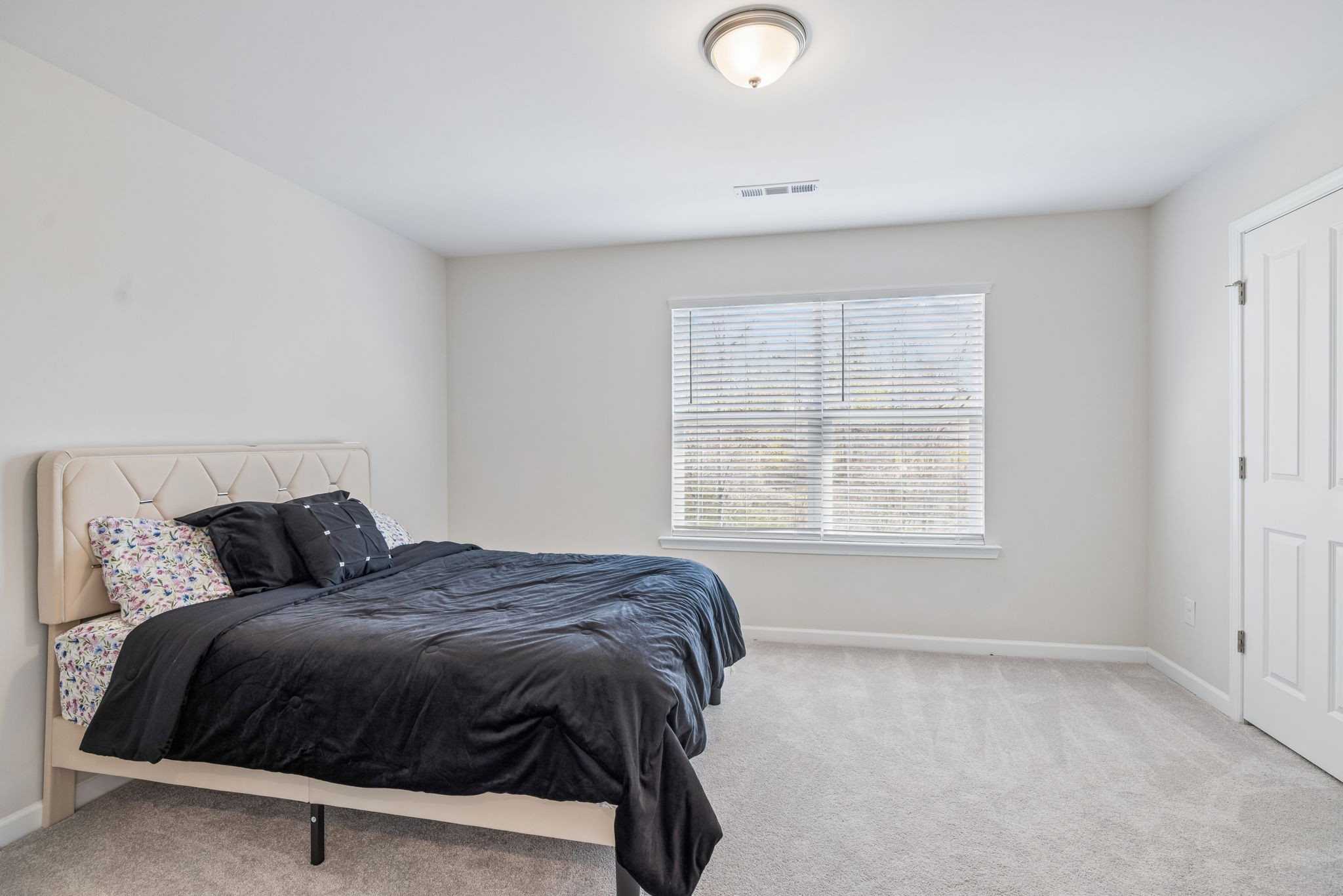 7503 Fernvale Springs Way Fairview, TN 37062 - Photo 46 of 60 a bedroom with a bed and a window