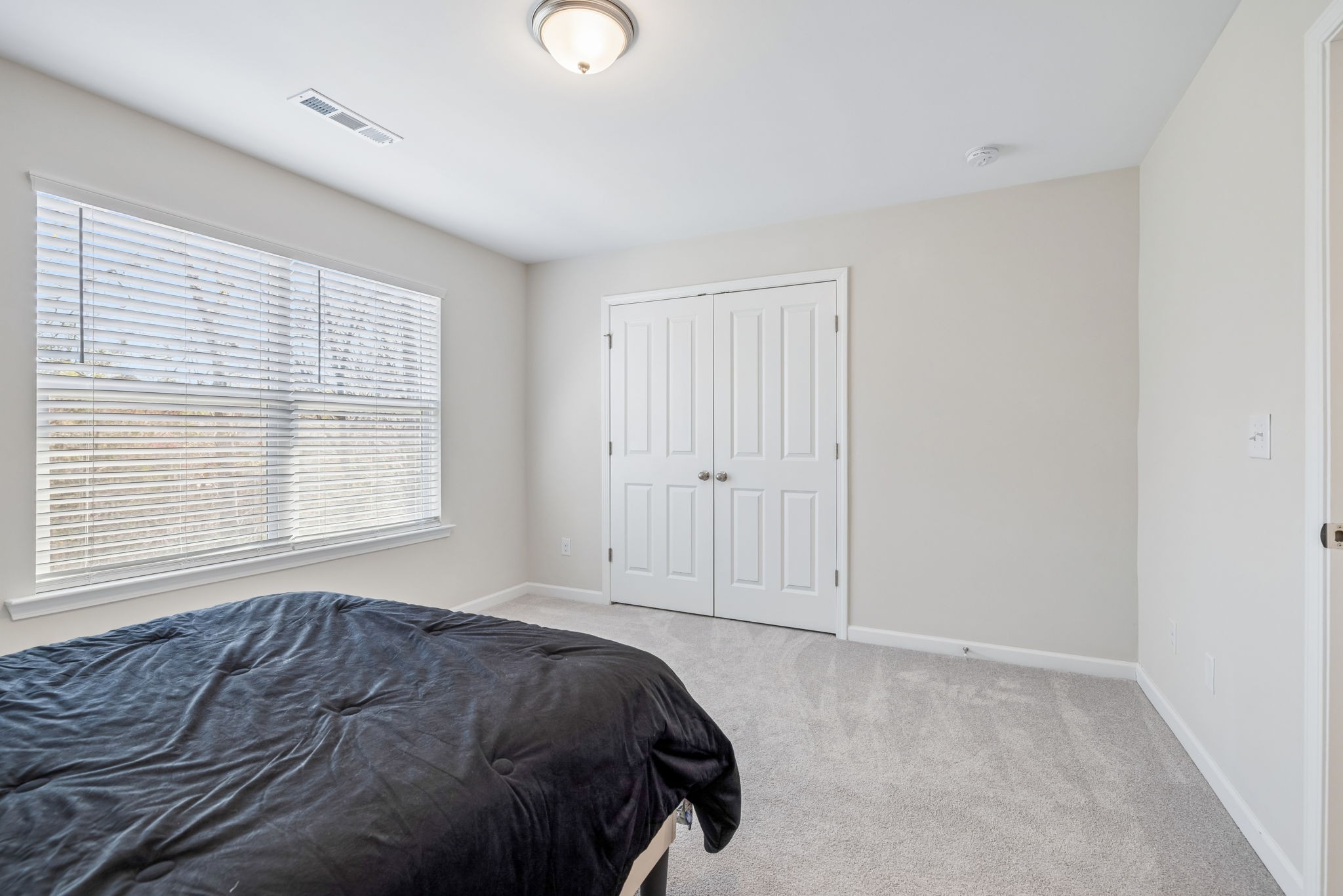 7503 Fernvale Springs Way Fairview, TN 37062 - Photo 48 of 60 a bedroom with a bed and a window
