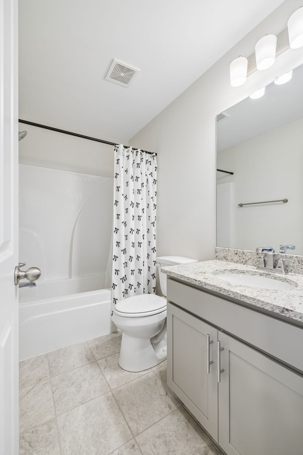 7503 Fernvale Springs Way Fairview, TN 37062 - Photo 49 of 60 a bathroom with a granite countertop sink toilet and shower