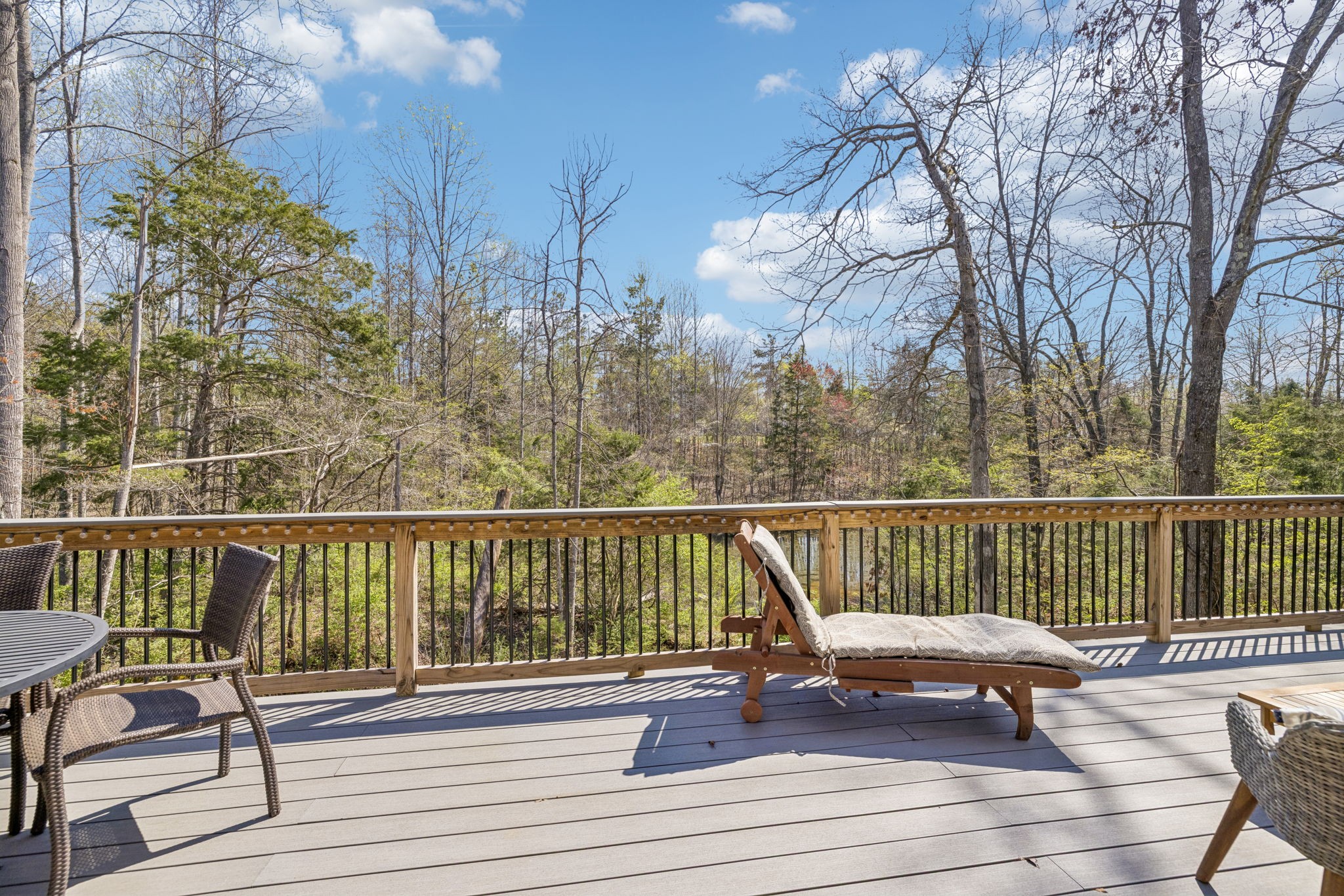 7503 Fernvale Springs Way Fairview, TN 37062 - Photo 50 of 60 a view of a deck with two chairs and wooden floor