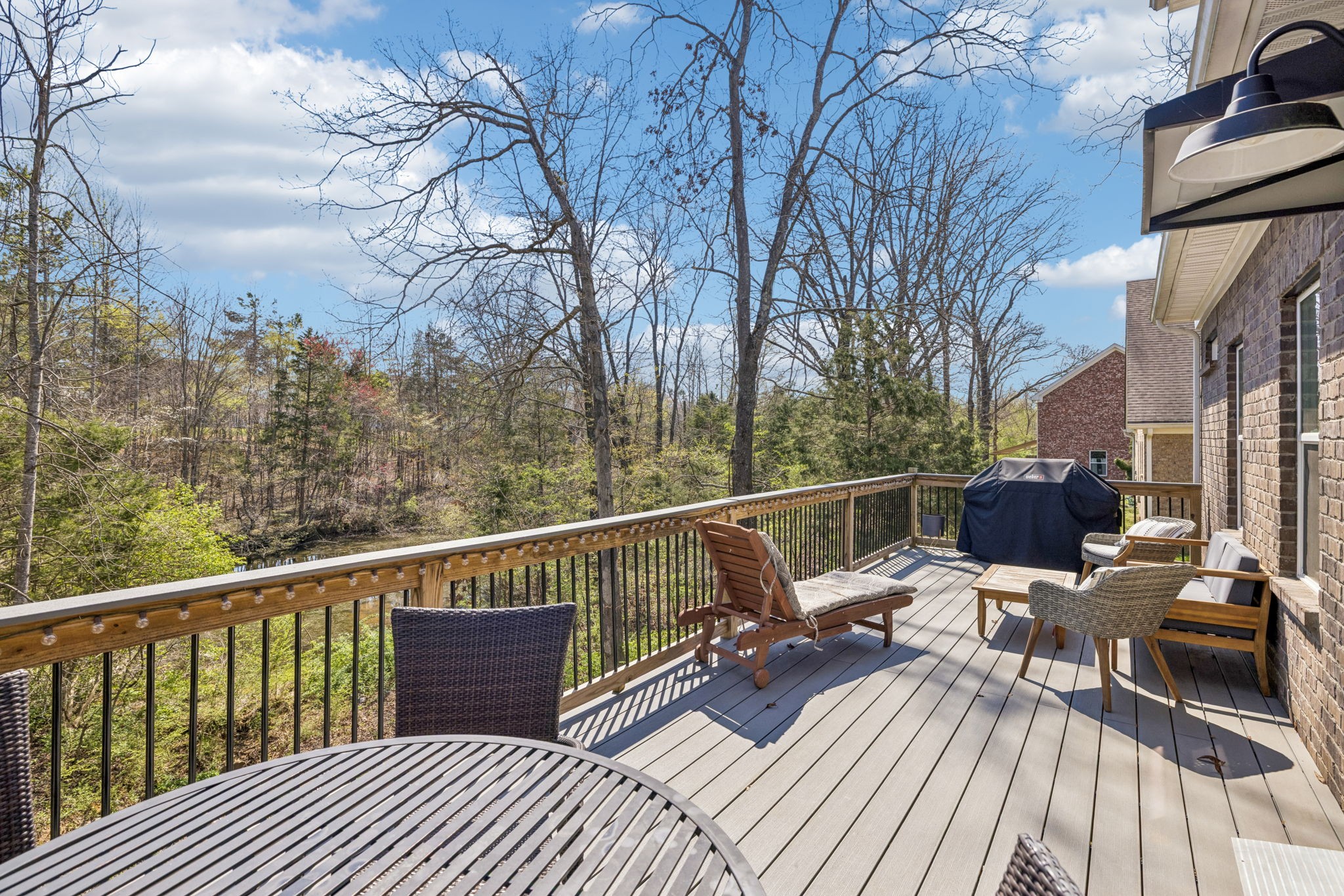 7503 Fernvale Springs Way Fairview, TN 37062 - Photo 51 of 60 a view of balcony with wooden floor and outdoor seating