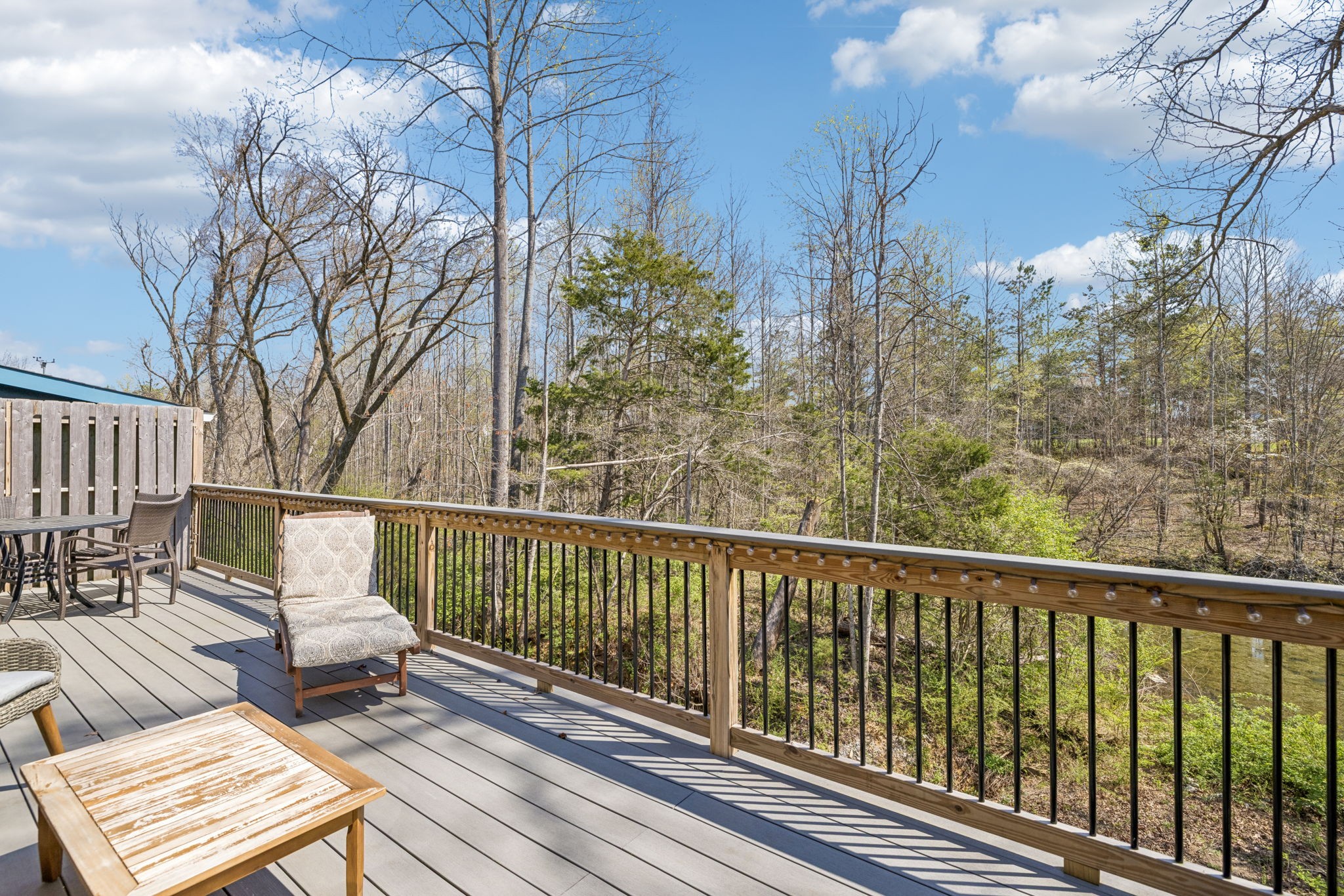 7503 Fernvale Springs Way Fairview, TN 37062 - Photo 53 of 60 a view of balcony with wooden floor and outdoor seating