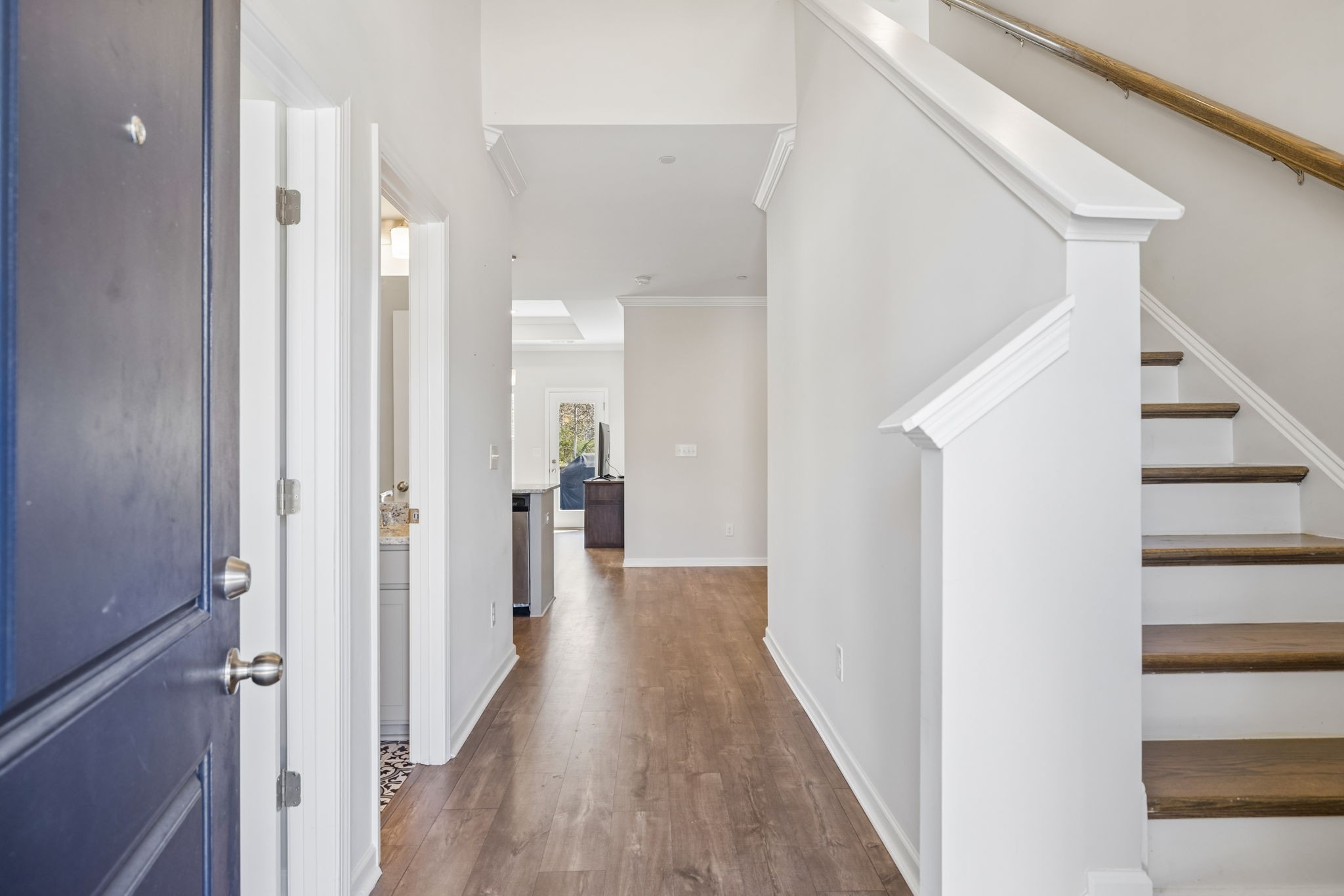 7503 Fernvale Springs Way Fairview, TN 37062 - Photo 6 of 60 a view of a hallway with wooden floor and entryway