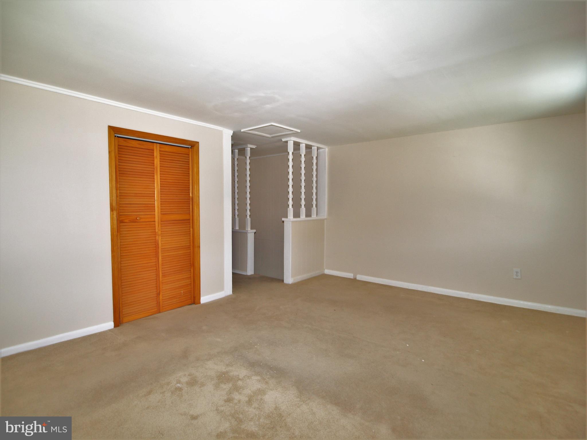 652 Charraway Road Baltimore, MD 21229 - Photo 12 of 22 an empty room with closet area