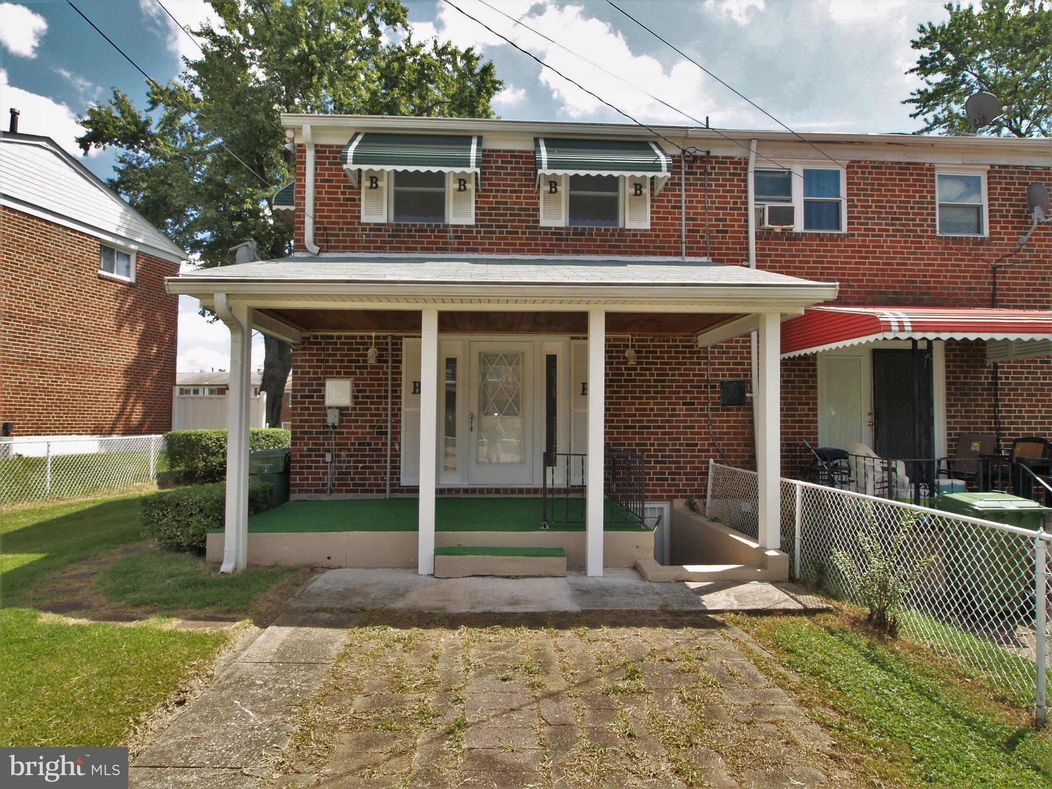 652 Charraway Road Baltimore, MD 21229 - Photo 19 of 22 a view of a house with backyard porch and sitting area