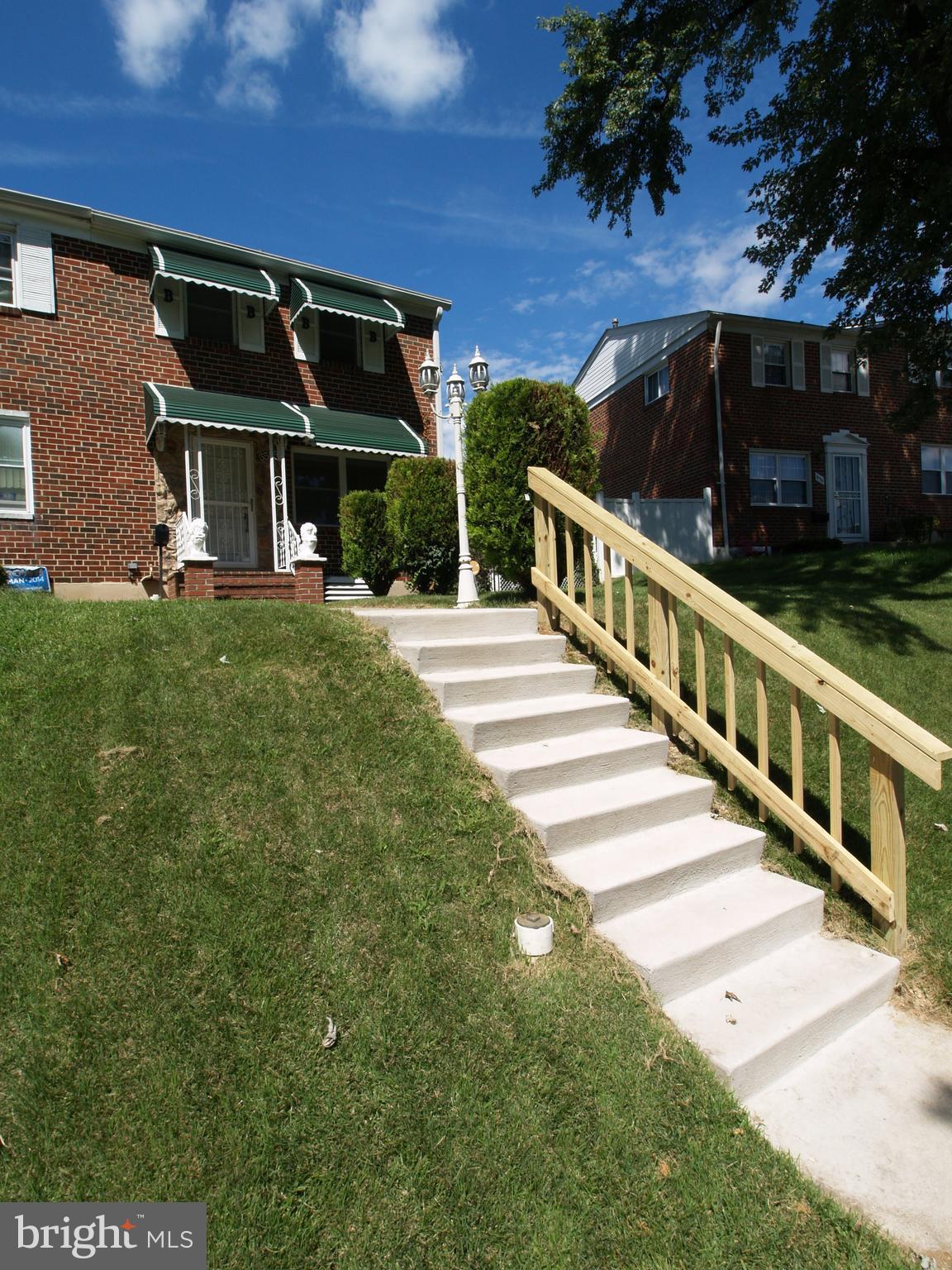 652 Charraway Road Baltimore, MD 21229 - Photo 22 of 22 a view of a house with backyard and porch