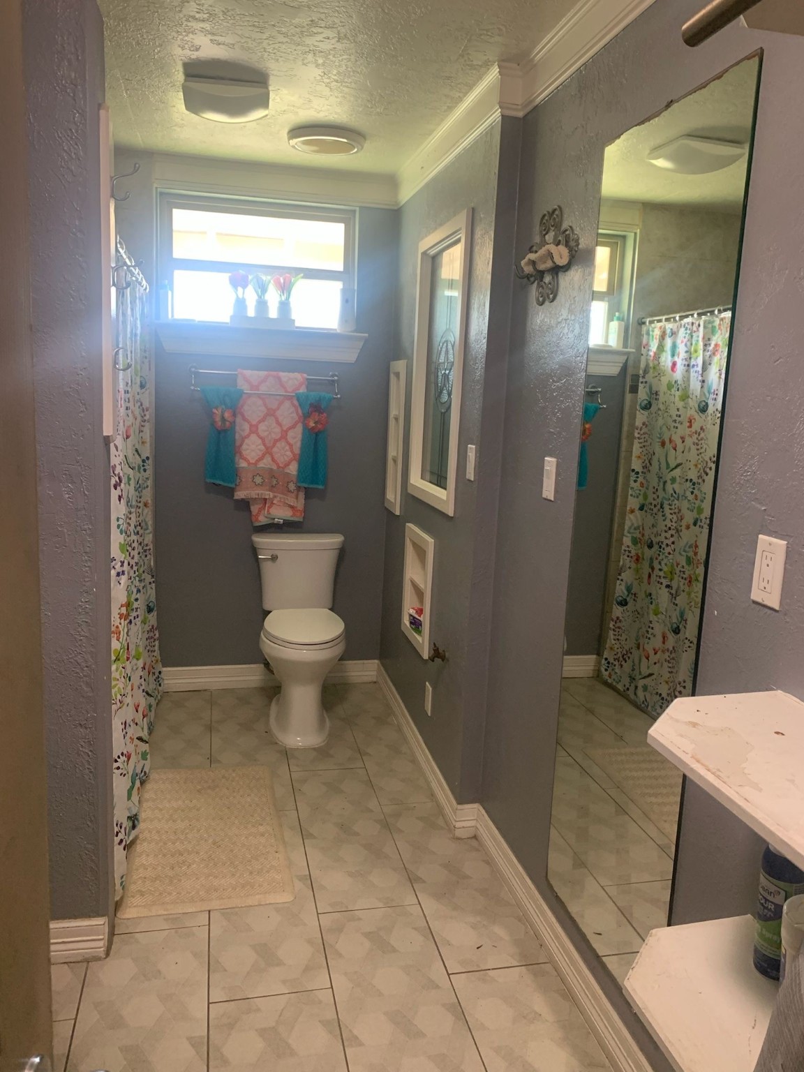7311 Roswell Street Houston, TX 77022 - Photo 13 of 18 a bathroom with a toilet and a shower