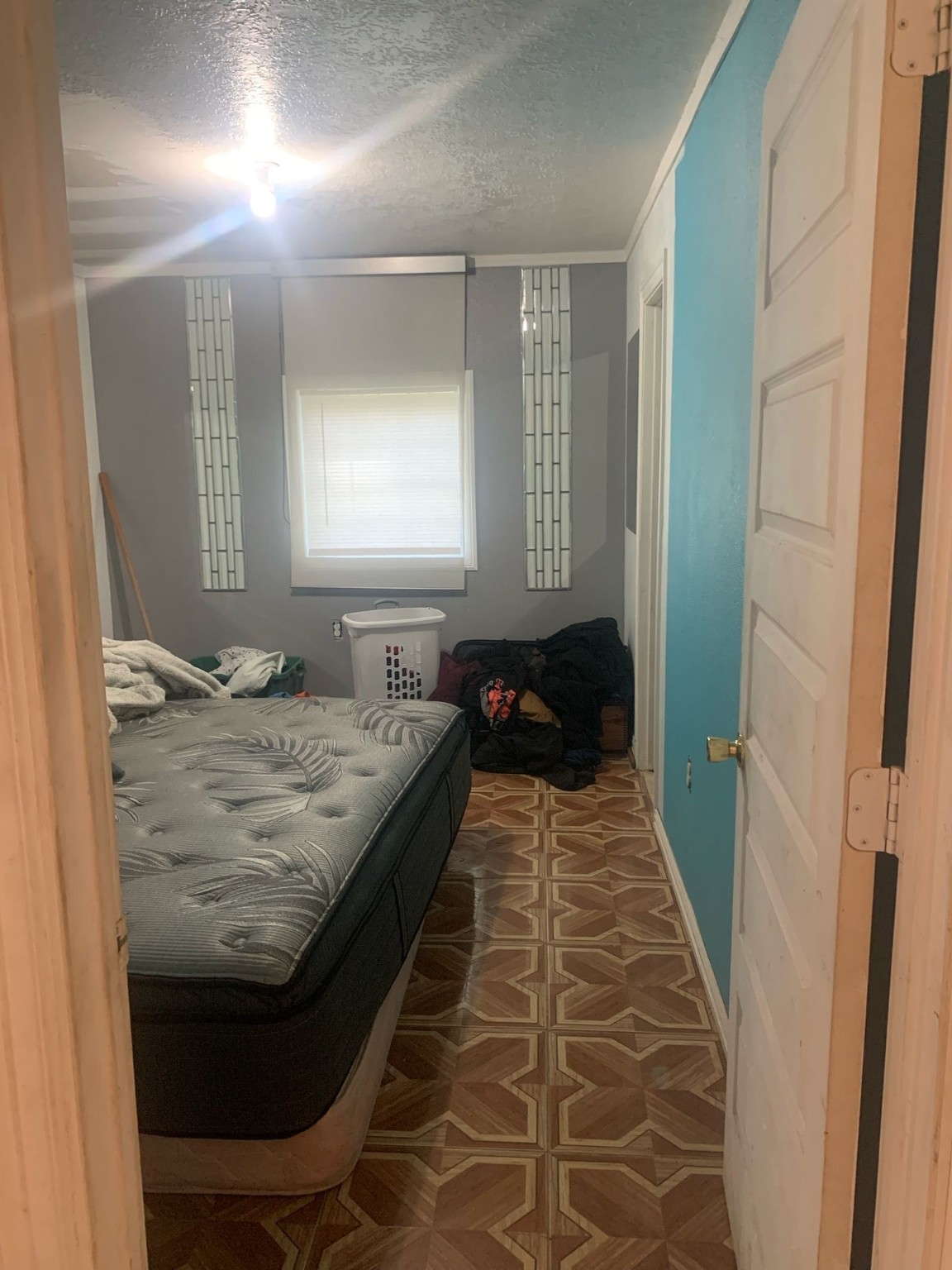 7311 Roswell Street Houston, TX 77022 - Photo 15 of 18 a bathroom with a granite countertop sink a toilet and a mirror