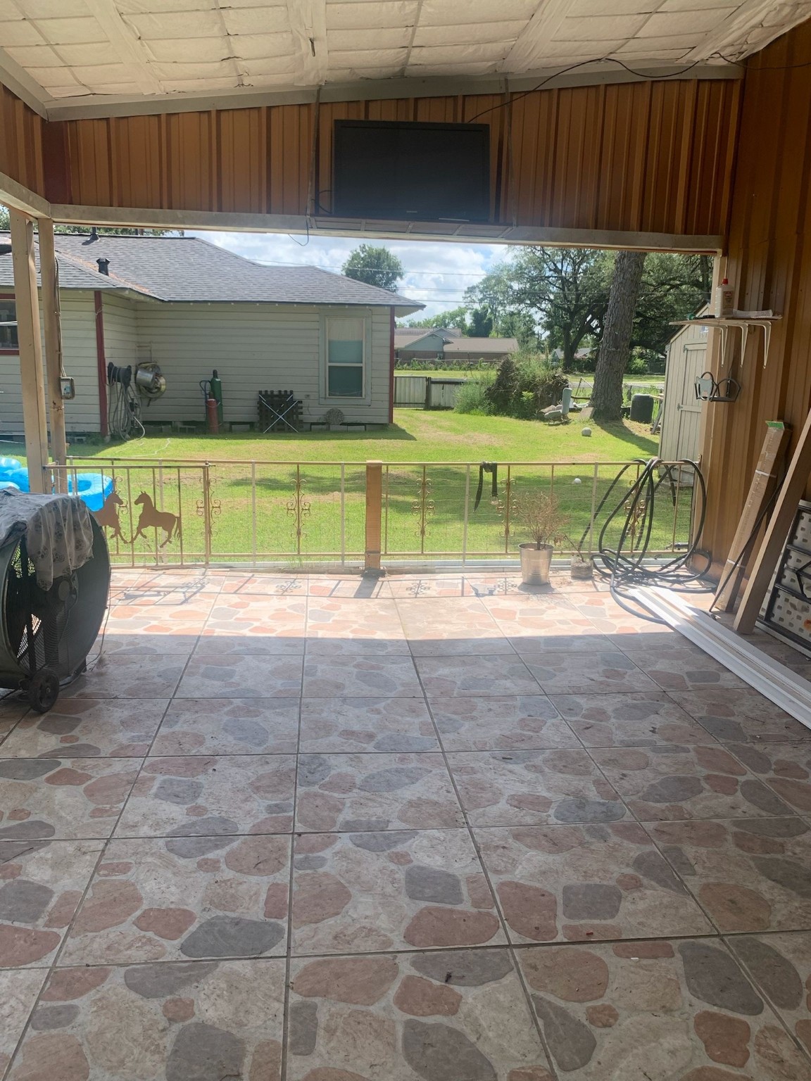 7311 Roswell Street Houston, TX 77022 - Photo 6 of 18 a view of backyard with outdoor seating and green space