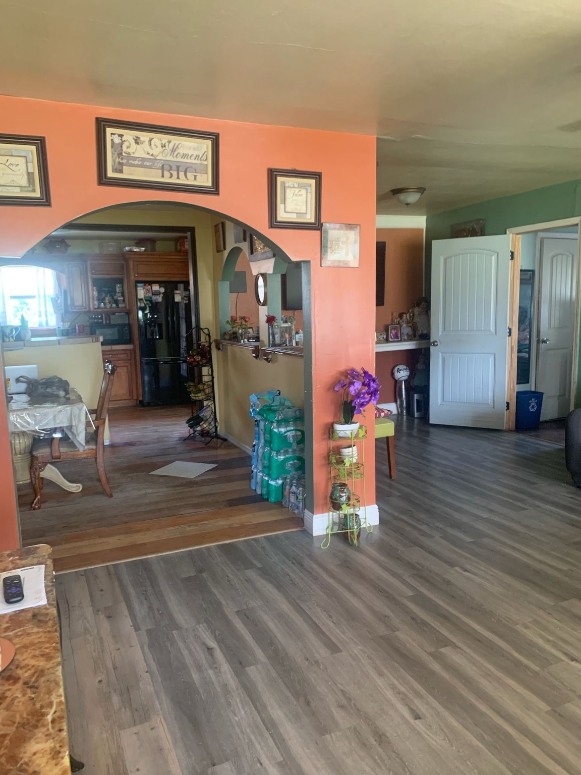 7311 Roswell Street Houston, TX 77022 - Photo 7 of 18 a view of a living room with clothes and shoes