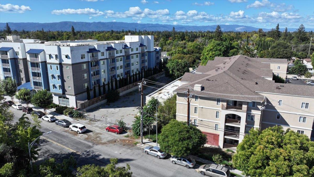 1747 Almaden Road San Jose, CA 95125 - Photo 17 of 28 a view of a house with a yard and potted plants