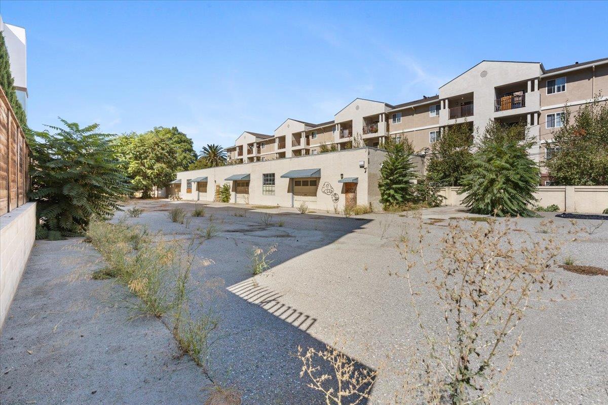 1747 Almaden Road San Jose, CA 95125 - Photo 3 of 28 a view of a big building with big yard and large trees