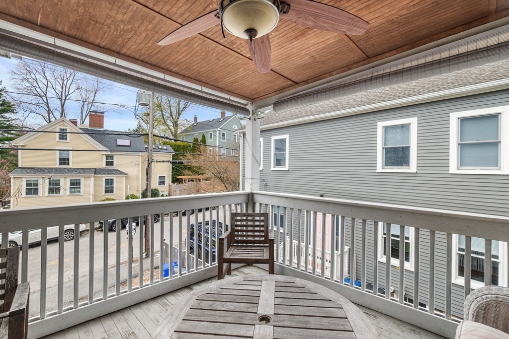 149 Elm Street Marblehead, MA 01945 - Photo 15 of 41 a view of a balcony with wooden floor