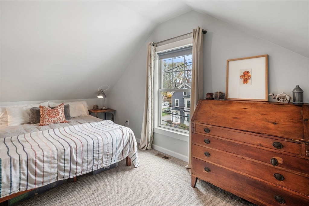 149 Elm Street Marblehead, MA 01945 - Photo 30 of 41 a bedroom with a bed and a window