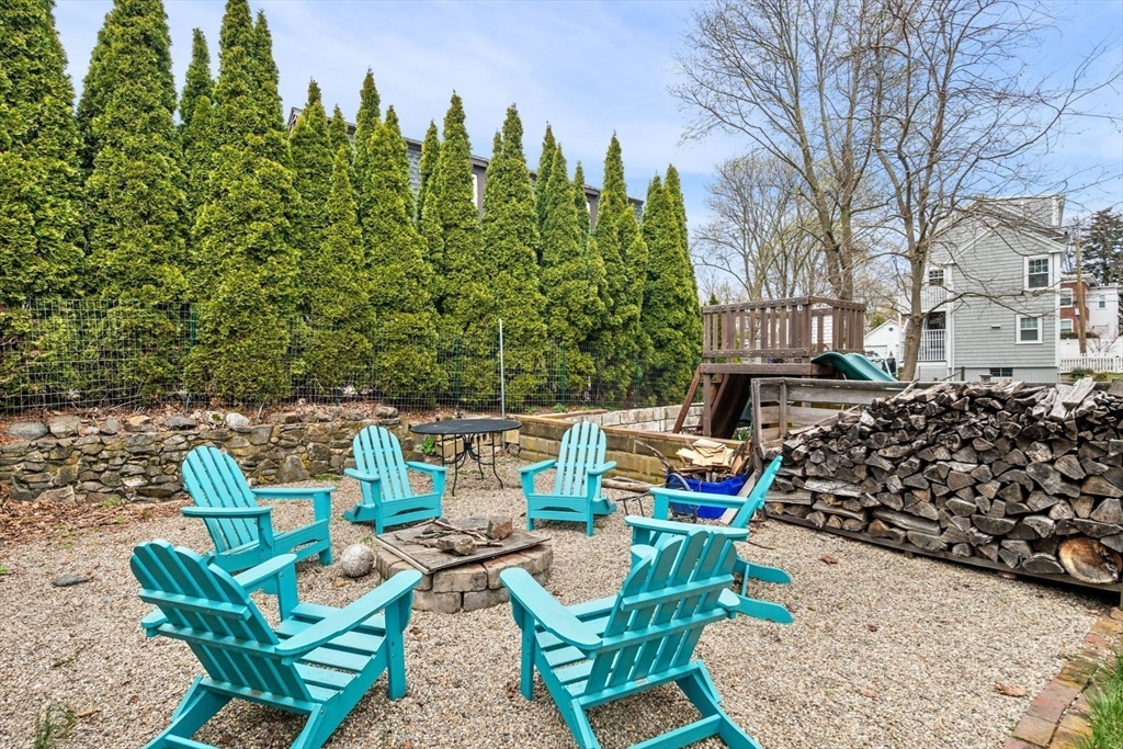 149 Elm Street Marblehead, MA 01945 - Photo 4 of 41 a view of a chairs and tables in the terrace