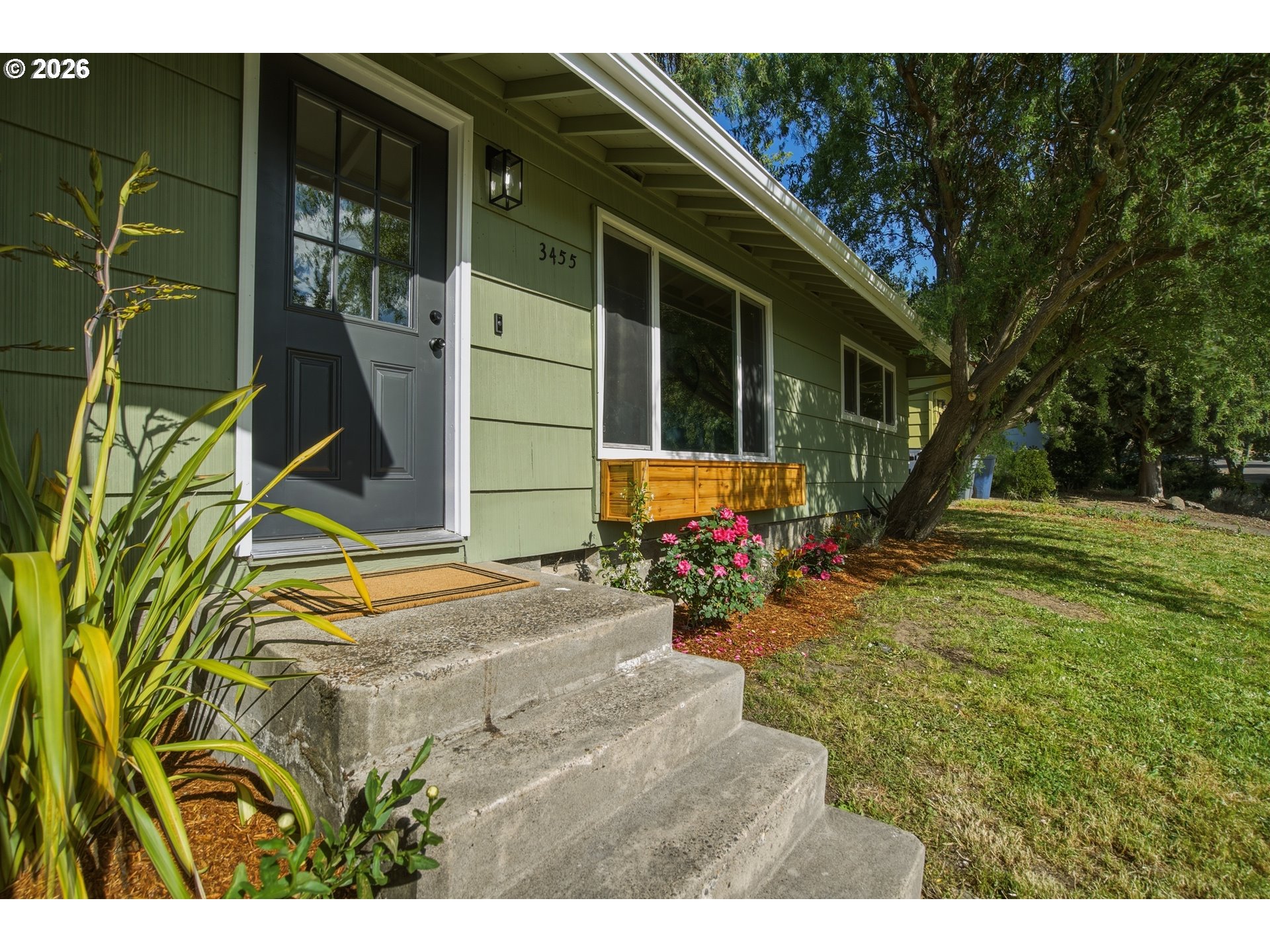 3455 Potter Street Eugene, OR 97405 - Photo 3 of 36 a backyard of a house with seating space