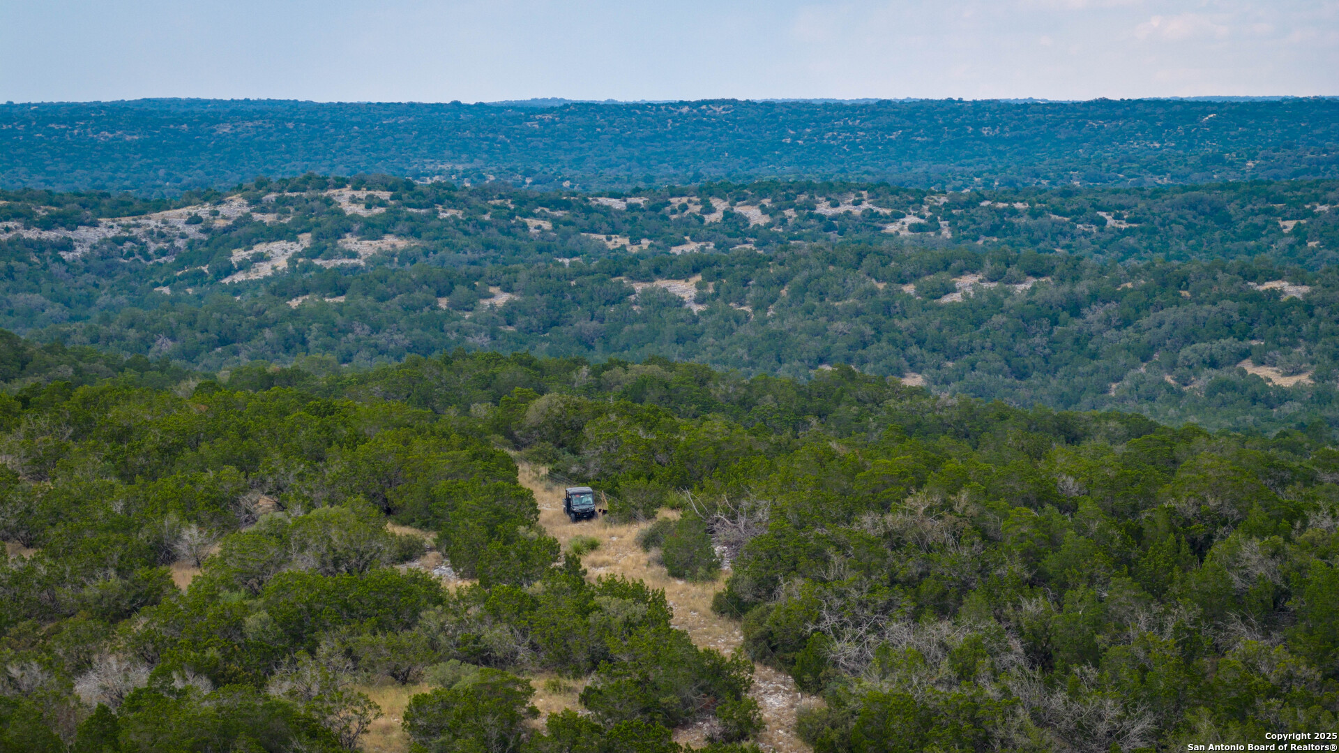 a view of a city and mountains