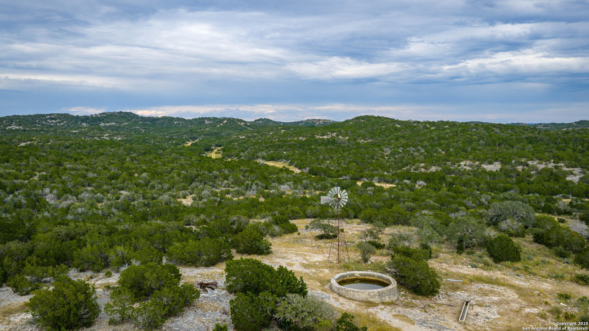 Tbd Tbd Rocksprings, TX 78880 - Photo 16 of 33 a view of a city with lush green forest