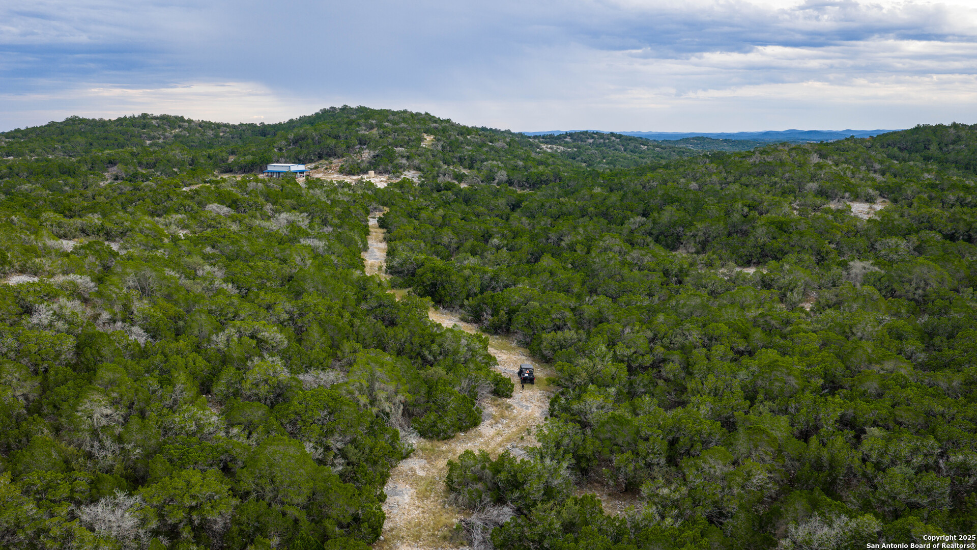 Tbd Tbd Rocksprings, TX 78880 - Photo 23 of 33 a view of a city with lush green forest