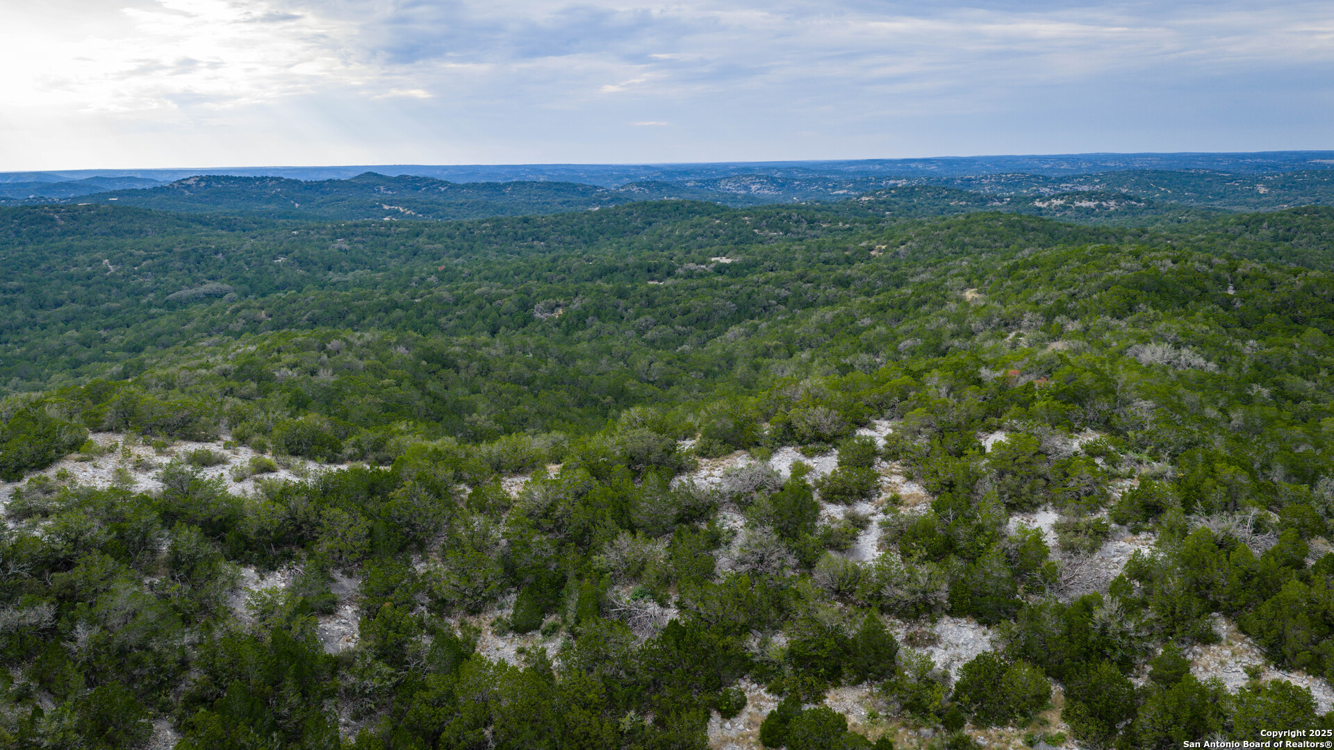 Tbd Tbd Rocksprings, TX 78880 - Photo 28 of 33 a view of a city with lush green forest