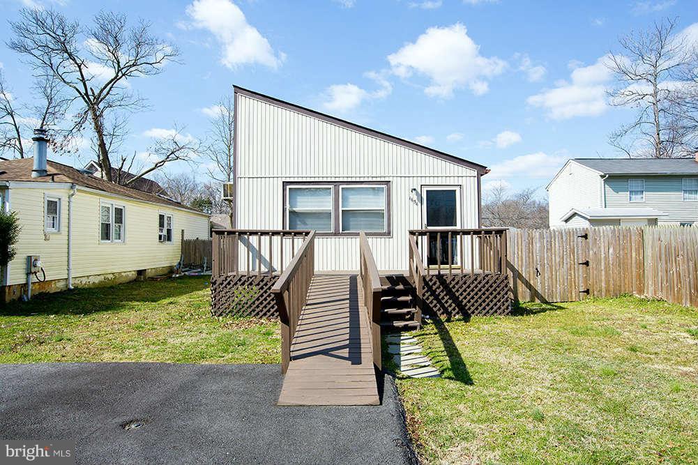 a view of backyard with deck