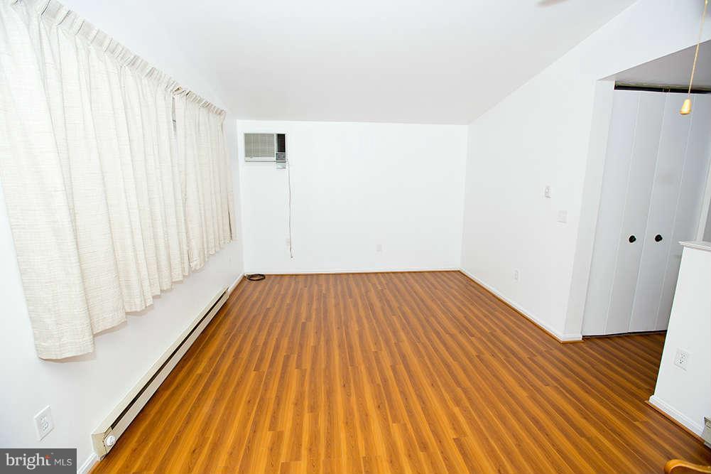 1634 Elkridge Drive Edgewater, MD 21037 - Photo 3 of 13 a view of a room with wooden floor and staircase