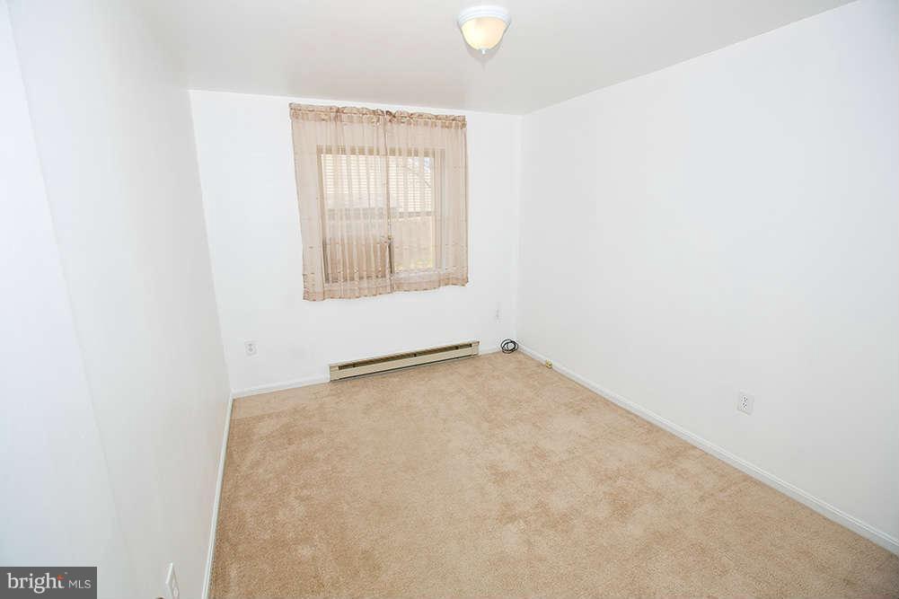 1634 Elkridge Drive Edgewater, MD 21037 - Photo 7 of 13 an empty room with a windows